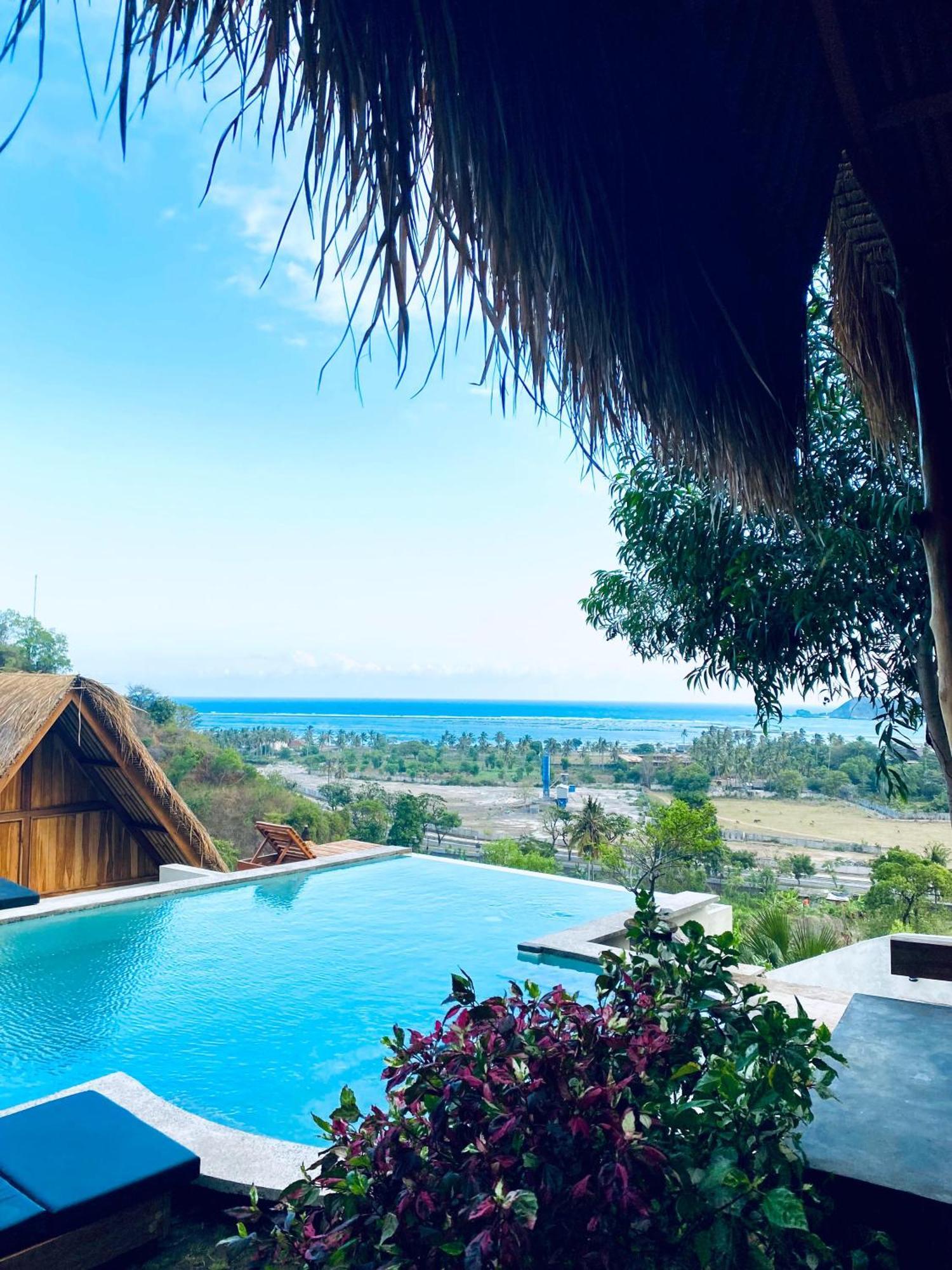 Sky Mountain Views Hotel Kuta  Exterior photo